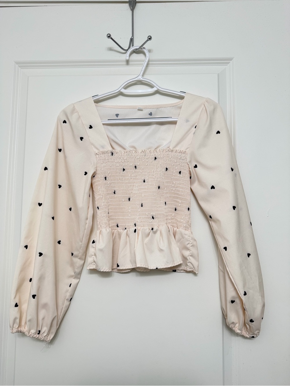 Square-Neck Cream Peplum Top with Black Heart Print
